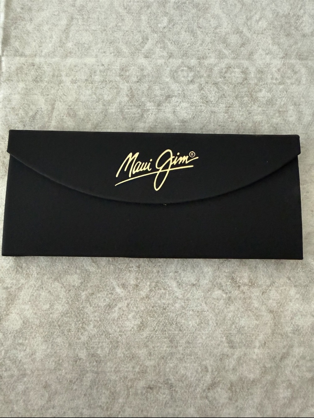 Maui Jim Black Sunglasses
Sleeve with Gold Script Logo
